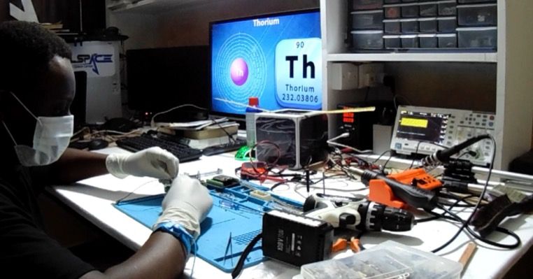Assembling the MapinduziSat-1 CubeSat structure on the lab bench